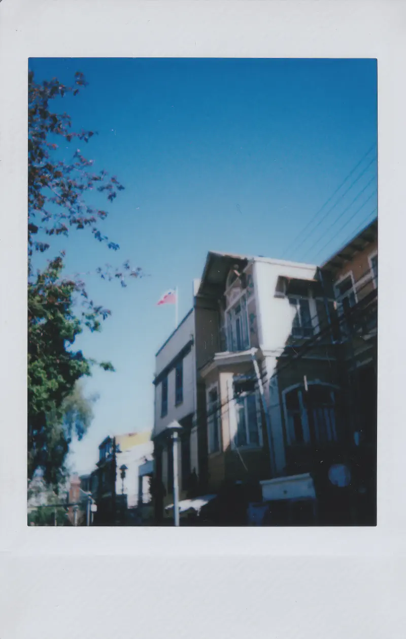 
A Chilean flag over a house.
