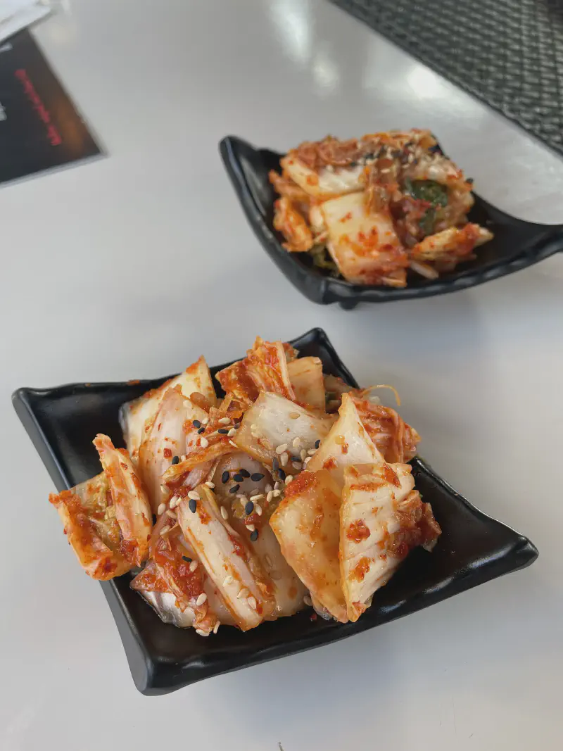 
Two kimchi servings.
